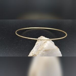 Archaic gold tone slim bracelet slider. B714